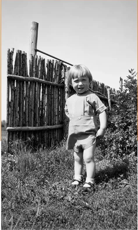The same pre-1950 photograph after hand colorization by MemoryCherish, natural color added
