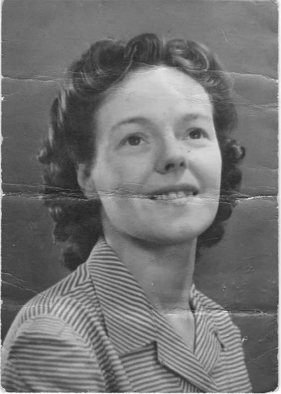 Damaged black-and-white photograph in need of professional photo restoration