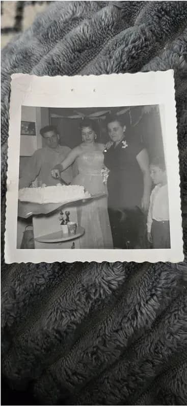 This black-and-white photograph had faded and worn before restoration