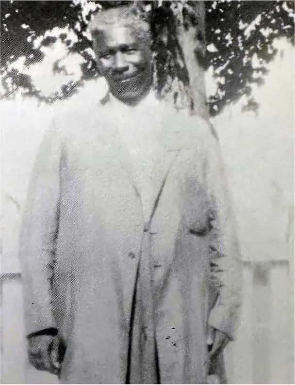 Damaged black-and-white photograph in need of professional photo restoration