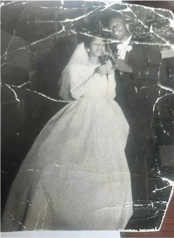 This black-and-white photograph had faded and worn before restoration