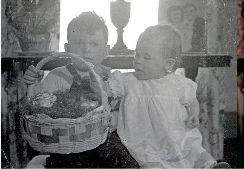 Damaged black-and-white photograph in need of professional photo restoration