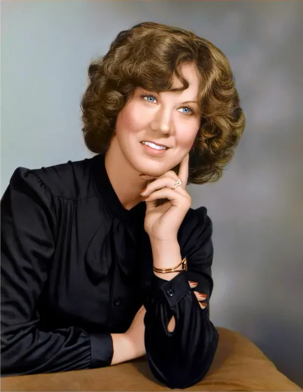 This discoloured photograph brought back to life by MemoryCherish photo restoration