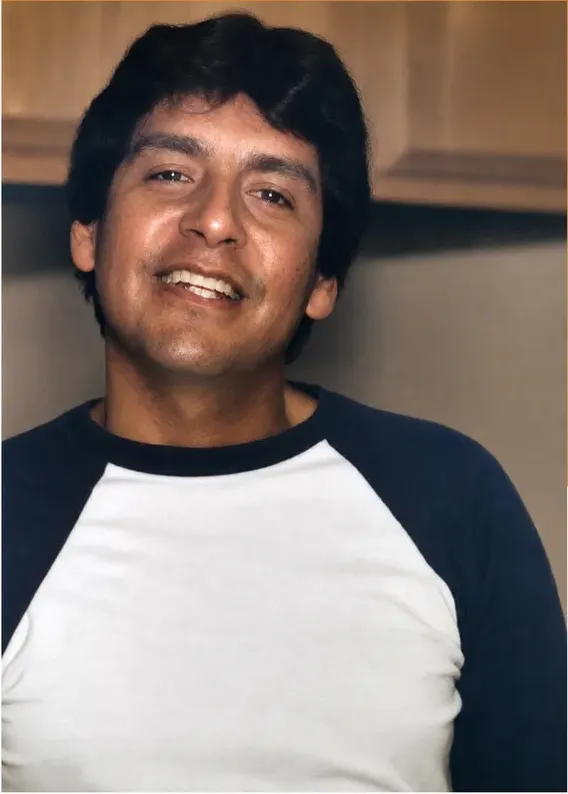 The same 1980s-plus photo restored by hand at MemoryCherish, discoloration corrected and clarity brought back