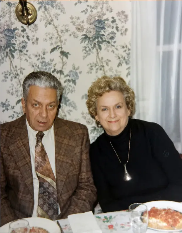 The same 1950s-1970s photo restored by hand at MemoryCherish, discoloration corrected and clarity brought back