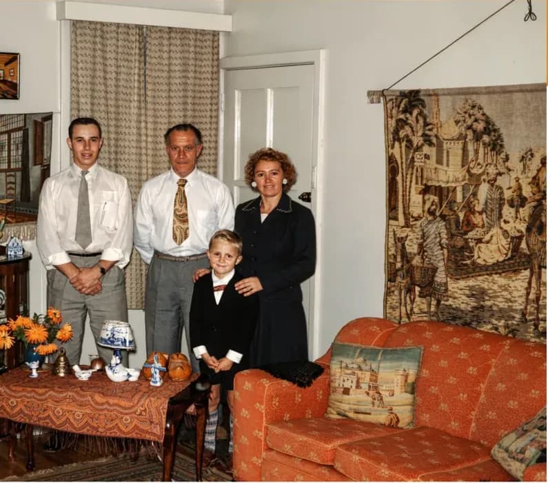 The same 1950s-1970s photograph after hand restoration by MemoryCherish, discoloration repaired and detail recovered