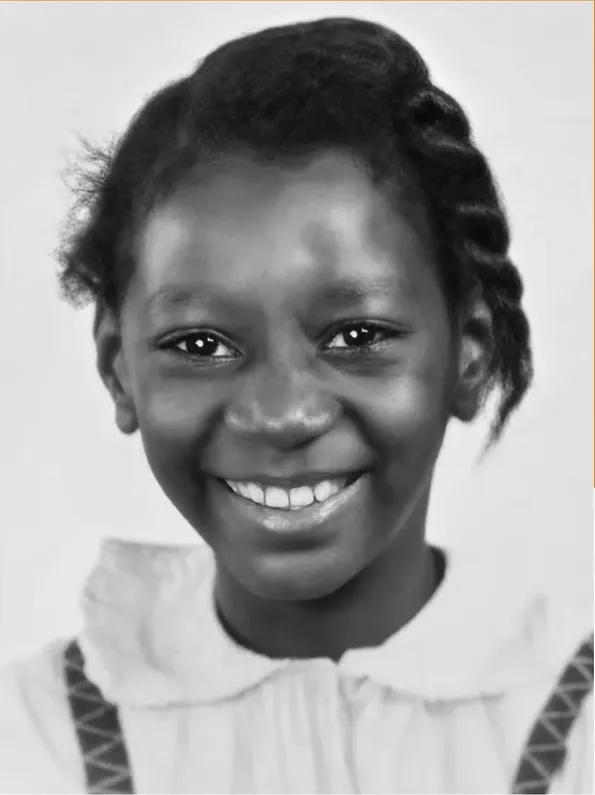 The same 1950s-1970s photograph after hand restoration by MemoryCherish, discoloration repaired and detail recovered