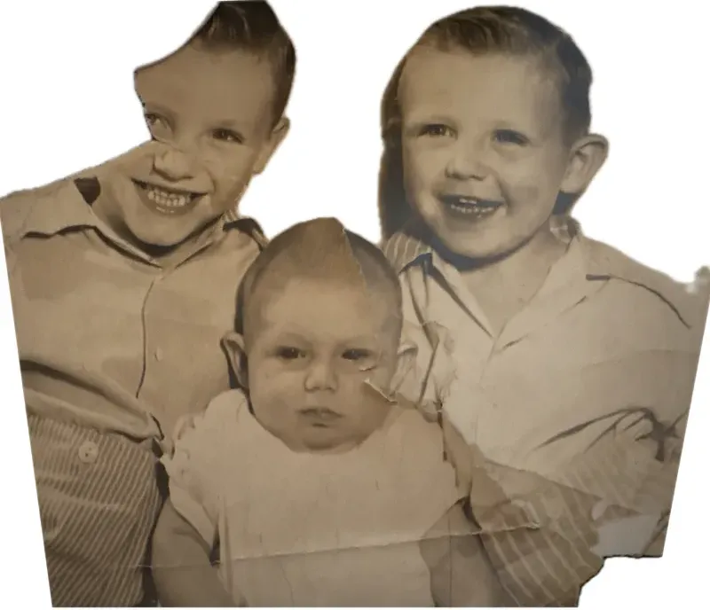 Old discoloured photograph showing its age, before photo restoration