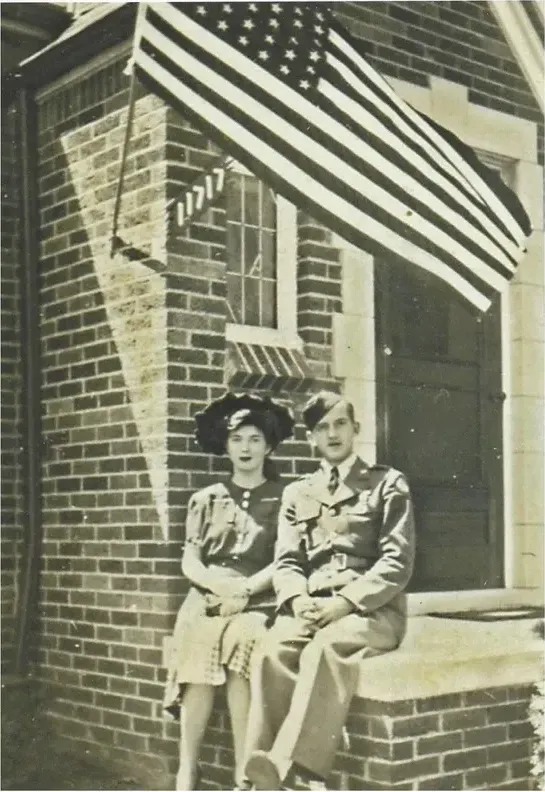 This discoloured photograph had faded and worn before restoration
