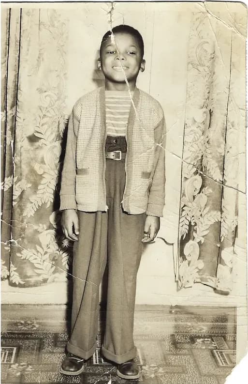 Old discoloured photograph showing its age, before photo restoration