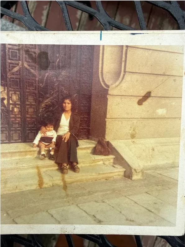 This discoloured photograph had faded and worn before restoration