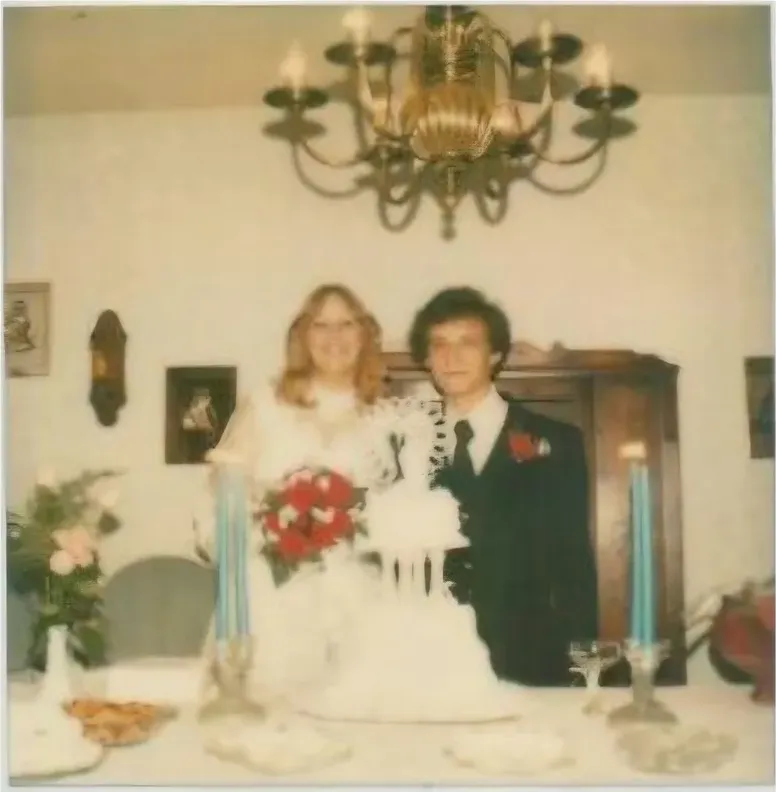 This discoloured photograph had faded and worn before restoration