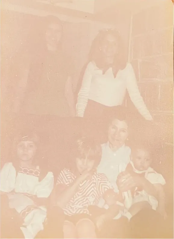 Old discoloured photograph showing its age, before photo restoration