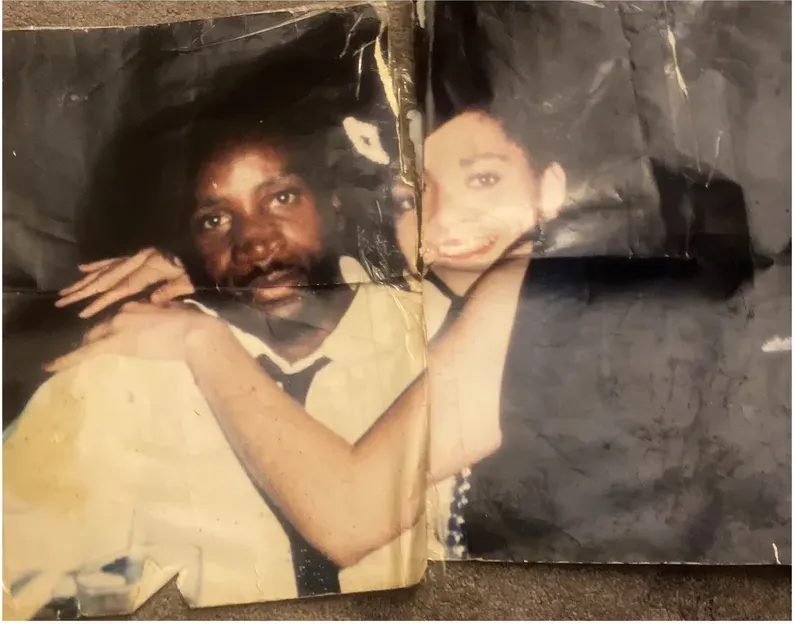 Creases and tears on a 1980s-plus photograph, before hand restoration by MemoryCherish artists
