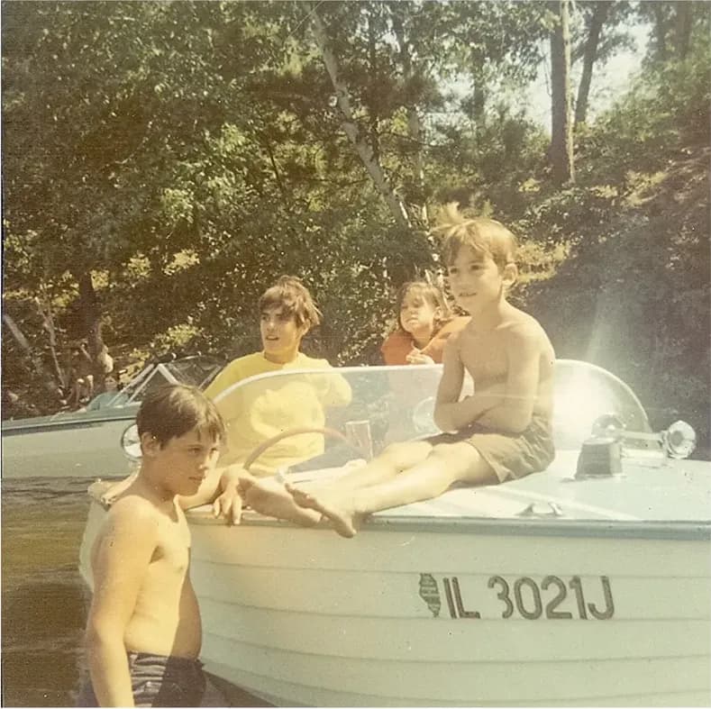 A treasured discoloured photograph, worn with time, before being restored