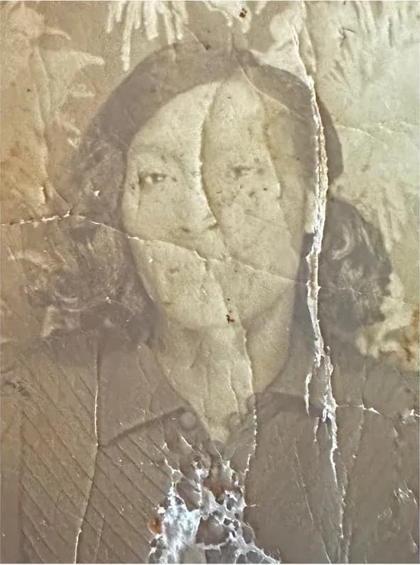 Original discoloured photograph before it was restored by hand