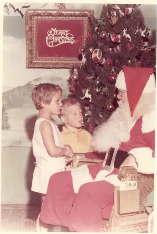 This discoloured photograph had faded and worn before restoration