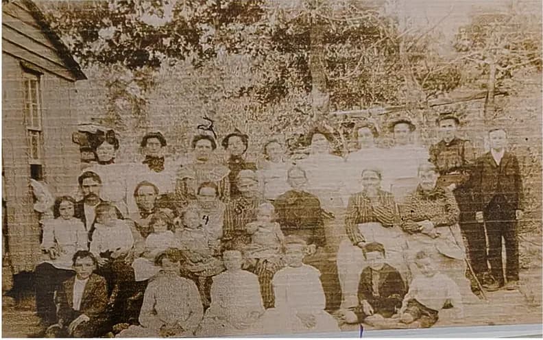 Original discoloured photograph before it was restored by hand