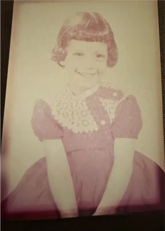 Original discoloured photograph before it was restored by hand