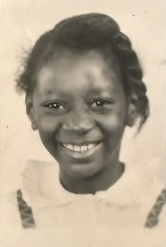 Discoloration on a 1950s-1970s photograph, before hand restoration by MemoryCherish artists
