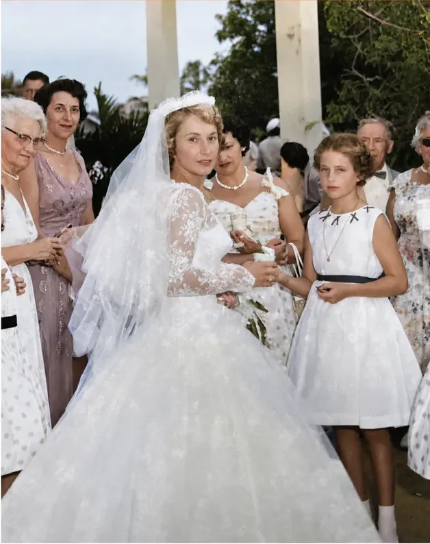 The same 1950s-1970s photograph after hand colorization by MemoryCherish, natural color added