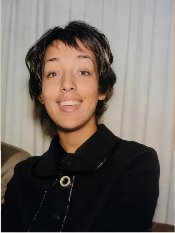 The same 1980s-plus photograph after hand restoration by MemoryCherish, blur repaired and detail recovered