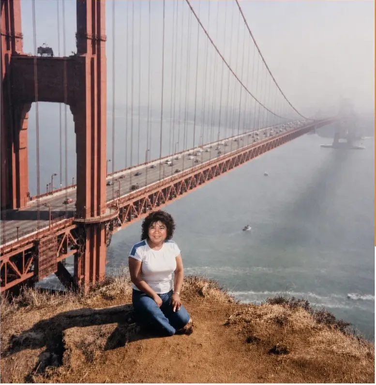 The same 1980s-plus photo restored by hand at MemoryCherish, fading corrected and clarity brought back