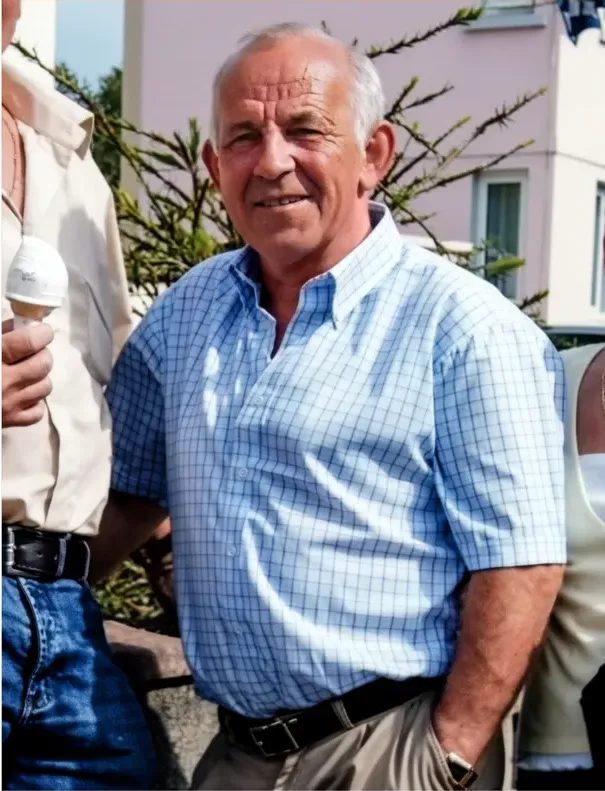 The same 1980s-plus photograph after hand restoration by MemoryCherish, fading repaired and detail recovered