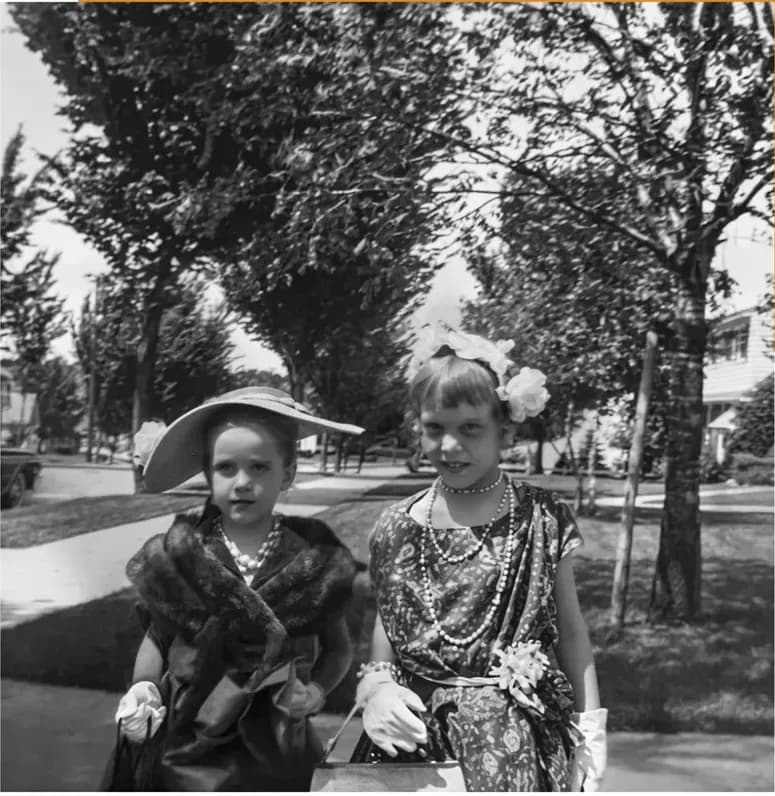 The same 1950s-1970s photograph after hand restoration by MemoryCherish, stains and marks repaired and detail recovered