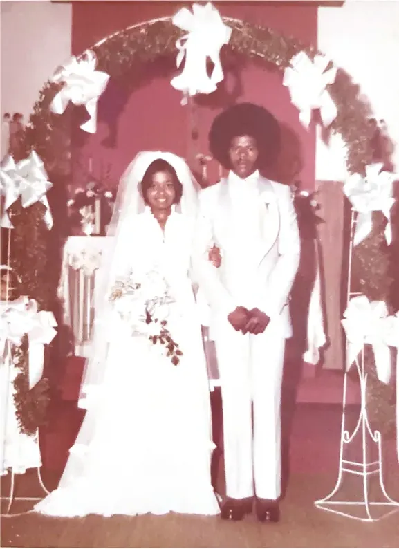 A treasured faded photograph, worn with time, before being restored