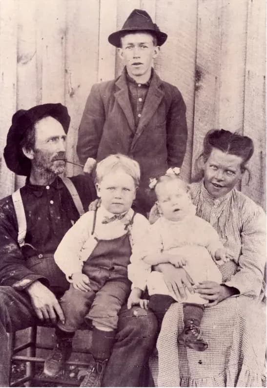 Old faded photograph showing its age, before photo restoration