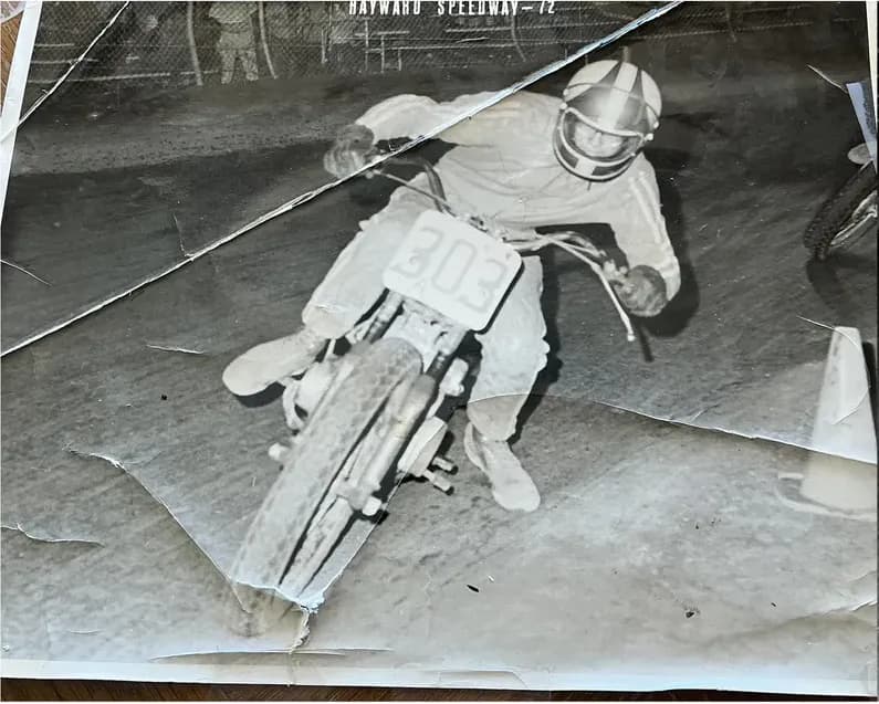 A treasured scratched photograph, worn with time, before being restored