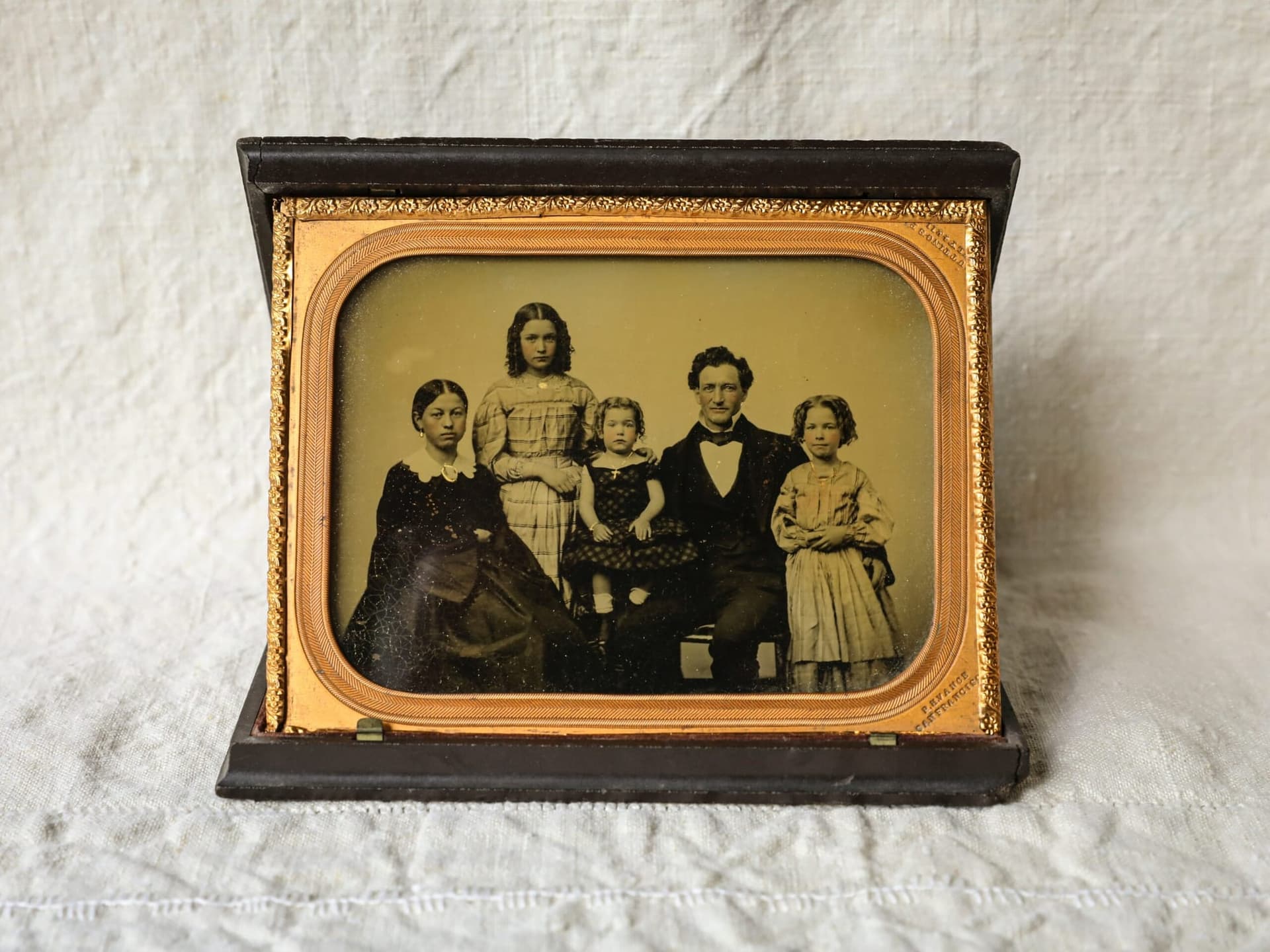 How to Trace the History of Your Old Family Photographs