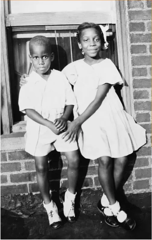 The same pre-1950 photograph after hand colorization by MemoryCherish, natural color added