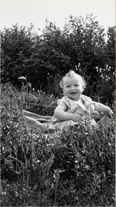 The same pre-1950 photograph after hand colorization by MemoryCherish, natural color added