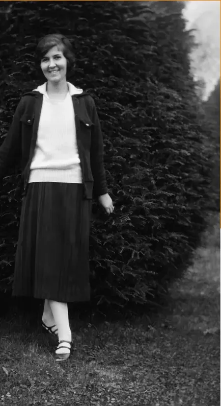 The same pre-1950 photograph after hand restoration by MemoryCherish, water damage repaired and detail recovered