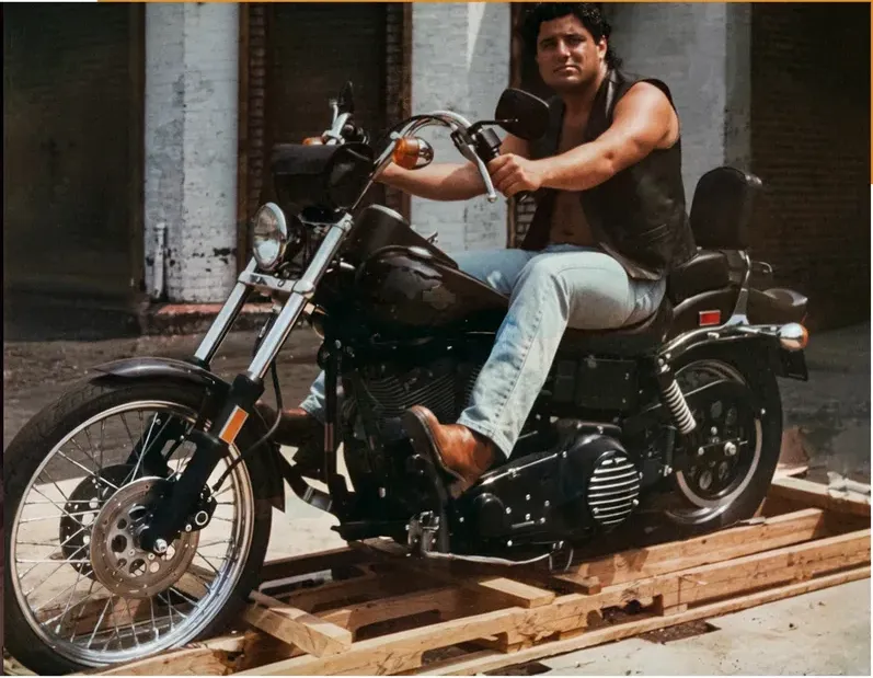 The same 1980s-plus photo restored by hand at MemoryCherish, water damage corrected and clarity brought back