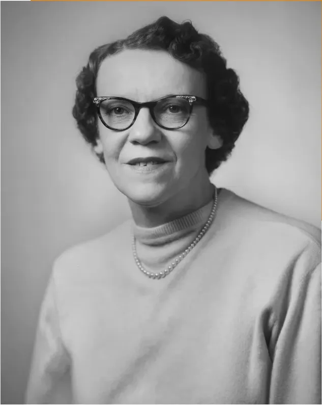 The same 1950s-1970s photograph after hand restoration by MemoryCherish, discoloration repaired and detail recovered