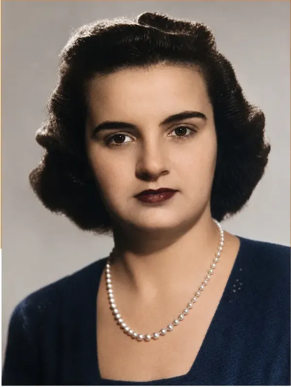 The same pre-1950 photograph after hand colorization by MemoryCherish, natural color added