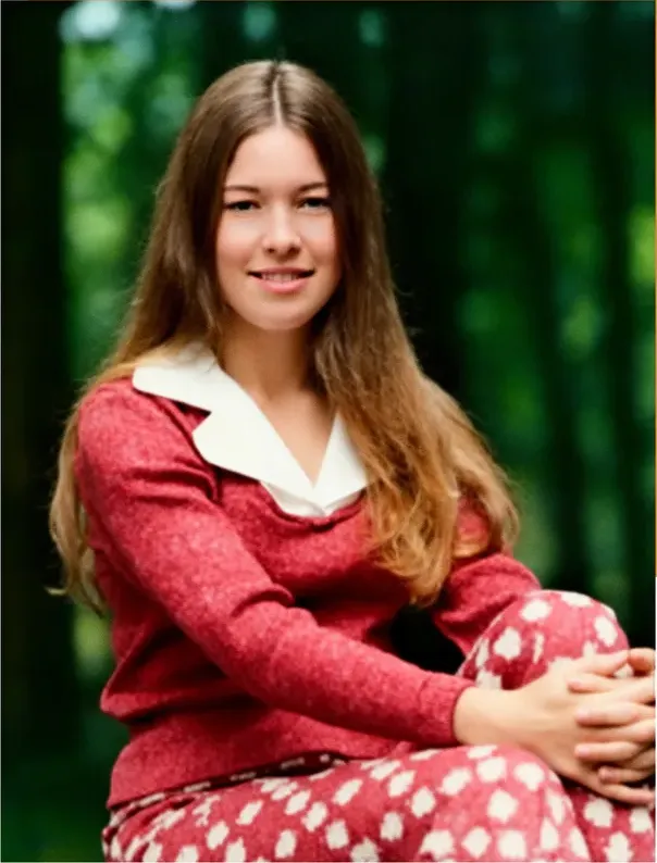The same 1950s-1970s photo restored by hand at MemoryCherish, discoloration corrected and clarity brought back