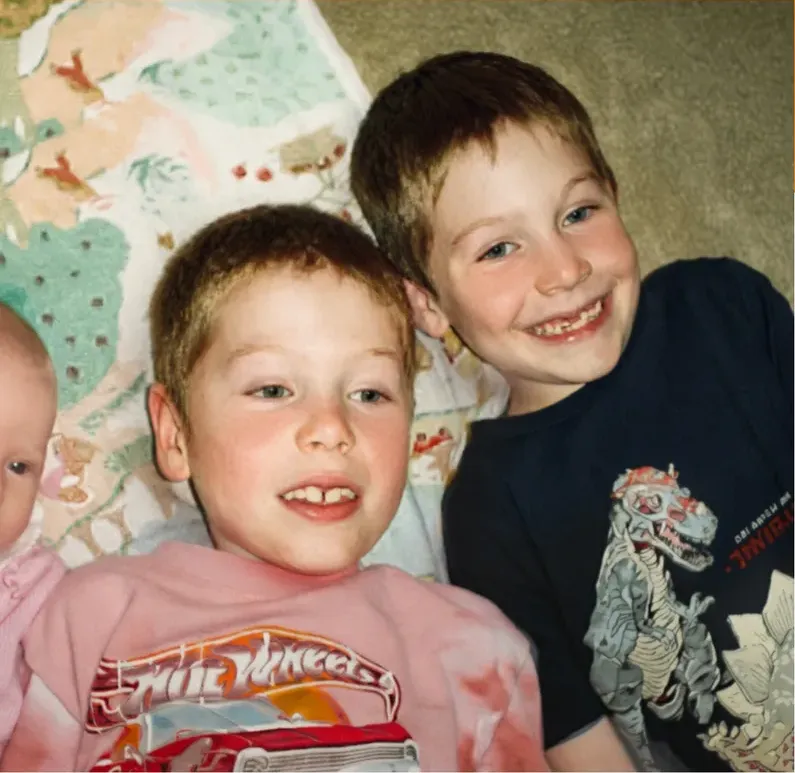 The same 1980s-plus photograph after hand restoration by MemoryCherish, discoloration repaired and detail recovered