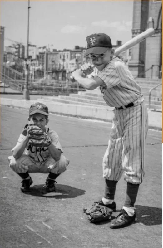 The same 1950s-1970s photo restored by hand at MemoryCherish, creases and tears corrected and clarity brought back