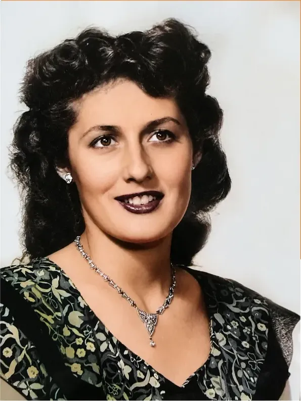 The same 1950s-1970s photograph after hand colorization by MemoryCherish, natural color added