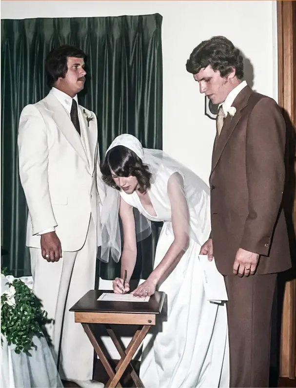 The same 1950s-1970s photo restored by hand at MemoryCherish, discoloration corrected and clarity brought back
