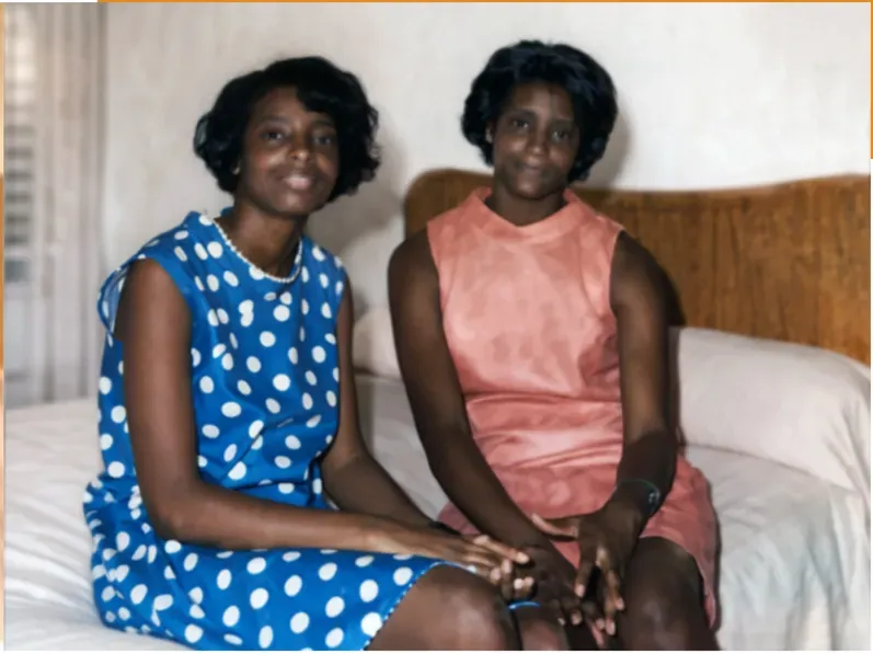 The same 1950s-1970s photograph after hand restoration by MemoryCherish, discoloration repaired and detail recovered