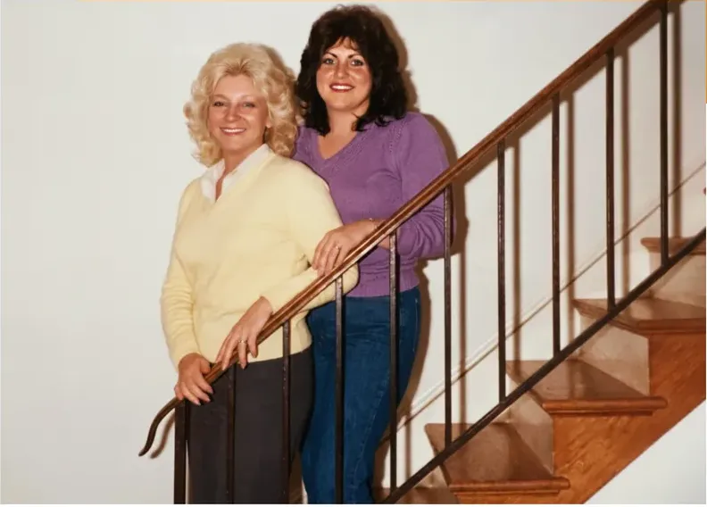 The same 1980s-plus photograph after hand restoration by MemoryCherish, water damage repaired and detail recovered