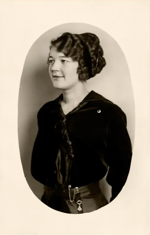 The same pre-1950 photo restored by hand at MemoryCherish, discoloration corrected and clarity brought back