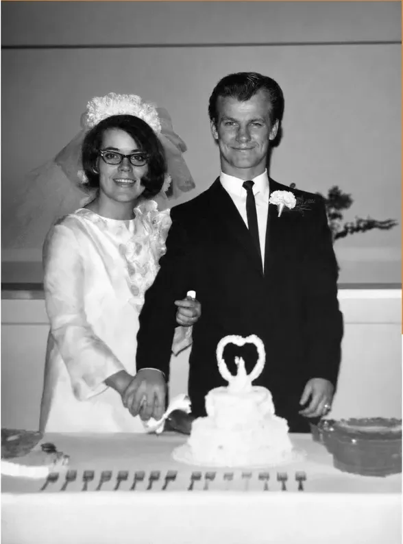 The same 1950s-1970s photograph after hand restoration by MemoryCherish, creases and tears repaired and detail recovered