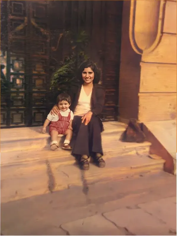 The same 1950s-1970s photo restored by hand at MemoryCherish, discoloration corrected and clarity brought back