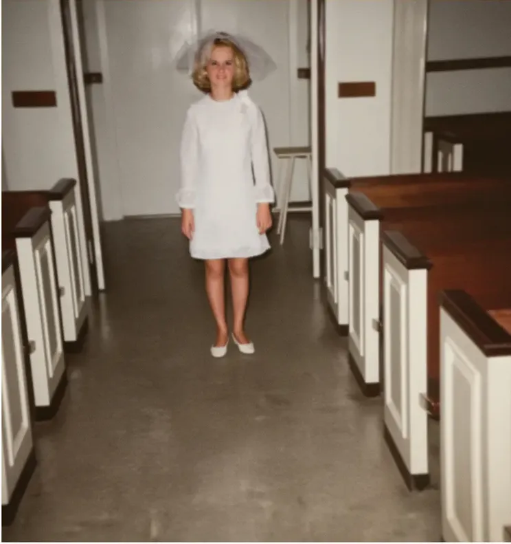 The same 1950s-1970s photo restored by hand at MemoryCherish, discoloration corrected and clarity brought back